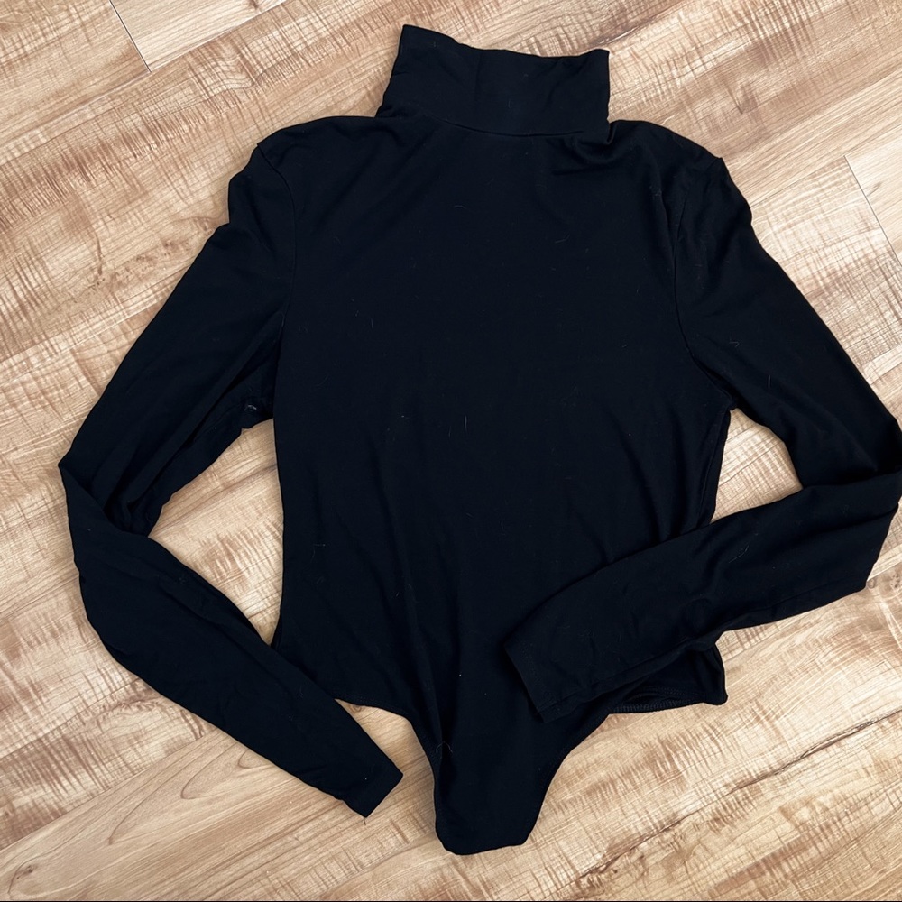 ASOS Design black turtleneck long-sleeve bodysuit. Size 6.